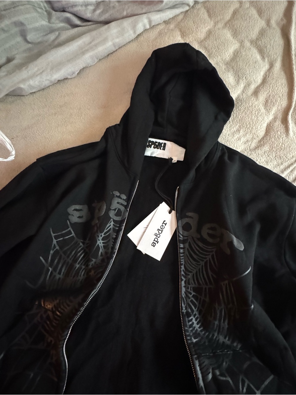 Black Zipped Spider Hoodie with Subtle Graphic